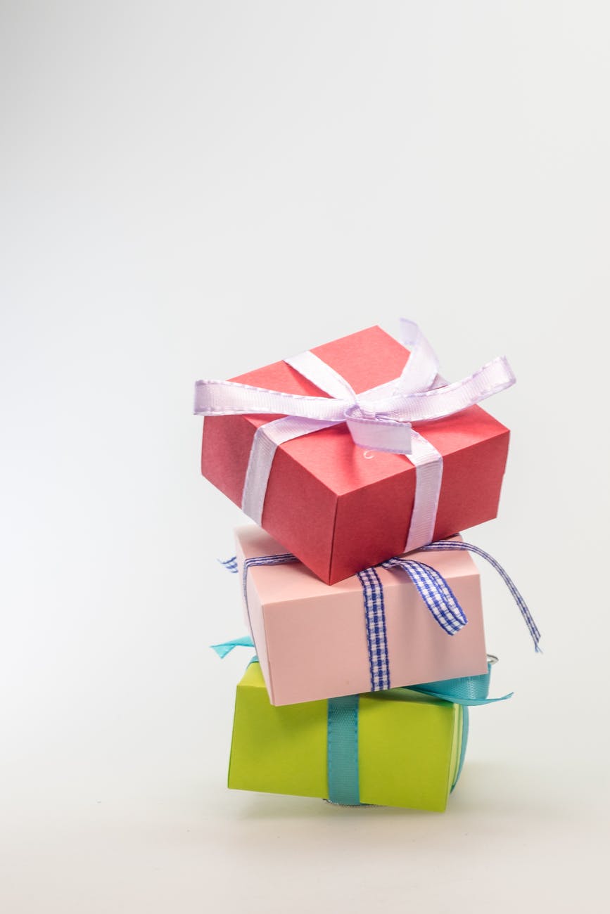 three stacked gift boxes with different colors